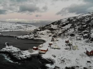 village norway drone snow mountains arctic